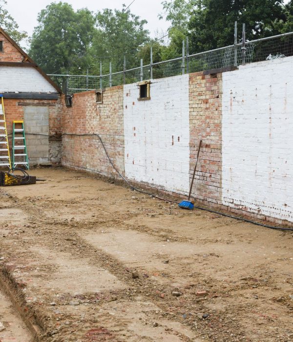 Demolition, rebuild and conversion of an outbuilding for extension of a period Victorian house in UK